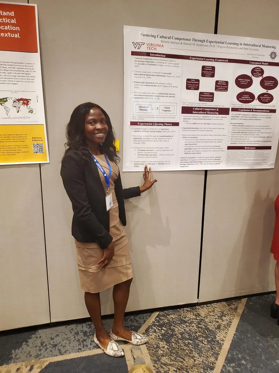 Bolanle Adebayo presenting a poster on cultural competence through experiential learning